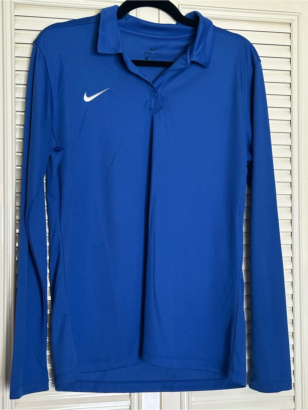 Nike Dri-FIT Performance Top in Blue with White Swoosh